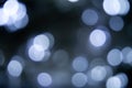 Blurred lights dark gray blue background. Abstract bokeh with soft light. Shiny festive christmas texture Royalty Free Stock Photo