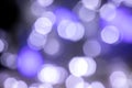 Blurred lights gray and blue background. Abstract bokeh with soft light. Shiny festive christmas texture Royalty Free Stock Photo