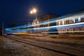 Blurred lights tram, night city Royalty Free Stock Photo