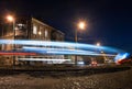 Blurred lights tram, night city Royalty Free Stock Photo