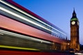 Blurred London double-decker bus passes Big Ben Royalty Free Stock Photo