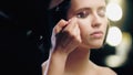 blurred makeup artist applying dark eye Royalty Free Stock Photo