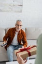 blurred man holding fathers day present Royalty Free Stock Photo