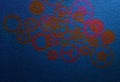 Blurred metal gears pattern on textured blue background Royalty Free Stock Photo