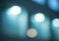 Blurred modern building interior with glowing ceiling lights abstract background Royalty Free Stock Photo
