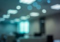 Blurred modern building interior with glowing ceiling lights abstract background Royalty Free Stock Photo