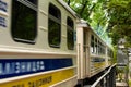 Blurred motion of carriages of narrow guage railway. Scenic nature landscape in Syretsky Park
