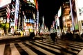 Blurred motion of cars, abstrakt motion blurry of city. Ginza crossing at night, Tokyo, Japan