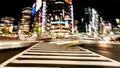 Blurred motion of cars, abstrakt motion blurry of city. Ginza crossing at night, Tokyo, Japan