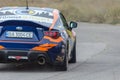 Blurred motion, defocus, noise, grain effect. A Subaru BRZ sport