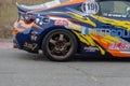 Blurred motion, defocus, noise, grain effect. A Subaru BRZ sport