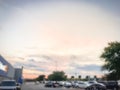 Blurry background outdoor parking garage with beautiful sunset cloud near Dallas Royalty Free Stock Photo