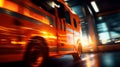 Blurred motion of an emergency ambulance speeding through city streets with lights and sirens