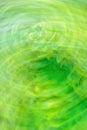 Blurred motion green bokeh under sunlight. Zooming green leaf natural blurred background Royalty Free Stock Photo