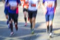 Blurred motion of group of marathon runners Royalty Free Stock Photo