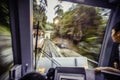 Blurred motion image from train driver cockpit while climbing the hill