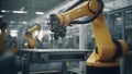 Blurred motion of robotic arm in factory