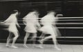 Blurred Motion Study of Four Figures Running Royalty Free Stock Photo