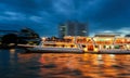 Blurred movement of boat over river at night