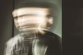 Blurred movement effect man in motion.Portrait of a guy