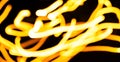Blurred moving fire lights background, yellow, orange and white colors on black, abstract template for design, high resolution Royalty Free Stock Photo