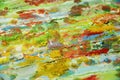 Blurred muddy watercolor green blue yellow orange background