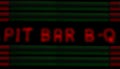 Blurred Neon Barbecue Sign With Green and Red Neon Tubes Vintage Local Restaurant