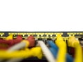 Blurred, network cables plug into switch hub Royalty Free Stock Photo