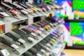 Blurred new smartphones stand in a row on a showcase in a store. Royalty Free Stock Photo