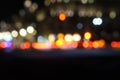 Blurred night city traffic lights. Abstract black background with bokeh effect Royalty Free Stock Photo