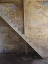 Blurred old staircase in dirty warehouse. Royalty Free Stock Photo