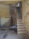 Blurred old staircase in dirty warehouse. Royalty Free Stock Photo