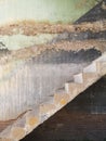 Blurred old staircase in dirty warehouse. Royalty Free Stock Photo