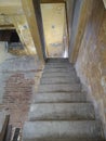 Blurred old staircase in dirty warehouse. Royalty Free Stock Photo