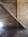 Blurred old staircase in dirty warehouse. Royalty Free Stock Photo