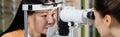 blurred ophthalmologist measuring eyesight Royalty Free Stock Photo