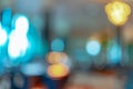 Blurred orange, yellow, and blue light bokeh abstract background. Defocused orange and white light on coffee shop or office Royalty Free Stock Photo