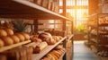 Blurred organic, eco-friendly vegan grocery, bakery store with wooden wall, parquet floor, variety of bread, bun, snack on shelf Royalty Free Stock Photo