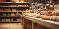 Blurred organic eco-friendly vegan grocery bakery store with wooden wall parquet floor variety of bread bun snack on shelf for Royalty Free Stock Photo