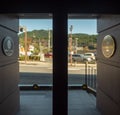 Blurred outdoor view looking from auto door at entrance hotel lobby for background Royalty Free Stock Photo