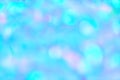 Blurred pastel neon blue mint pink holographic bokeh background texture Royalty Free Stock Photo