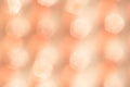 Blurred pastel orange-peach background. trendy color 2024 Peach Fuzz