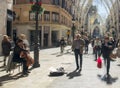 Blurred pedestrains and Busker in Southern Spain Royalty Free Stock Photo