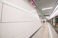 Blurred people on subway platform with moving train Royalty Free Stock Photo