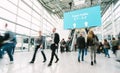 Blurred business people at a trade fair hall Royalty Free Stock Photo