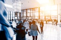 Blurred people walking in a trade fair hall Royalty Free Stock Photo