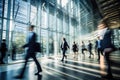 Blurred people walking in a modern hall. Royalty Free Stock Photo