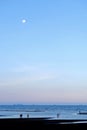 When the moon hits the blue sky with seascape in lately evening