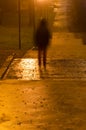 Blurred person silhouette in dark