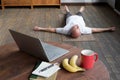 Blurred phot of senior caucasian man lying in Shavasana pose Royalty Free Stock Photo